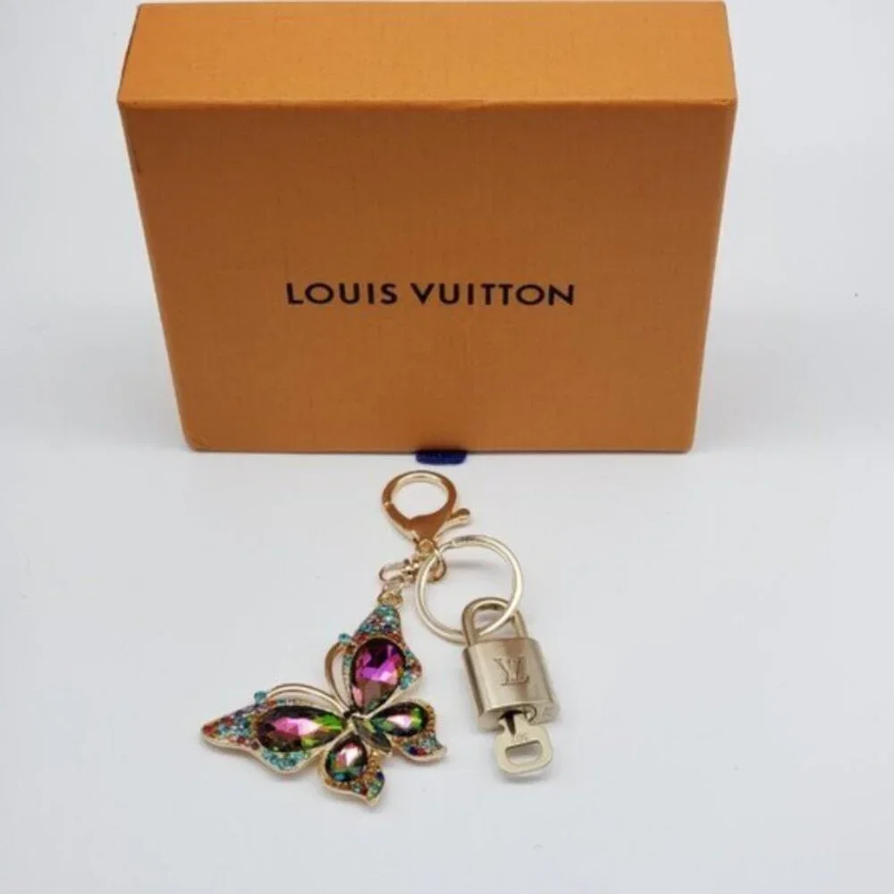 Authentic Louis Vuitton Gold Lock & Box w/ Unbranded Butterfly Bagcharm 122725